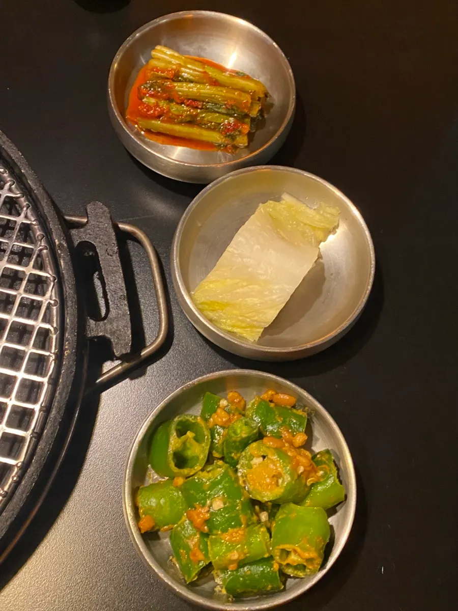 Baek kimchi and doenjang-tossed peppers side dishes