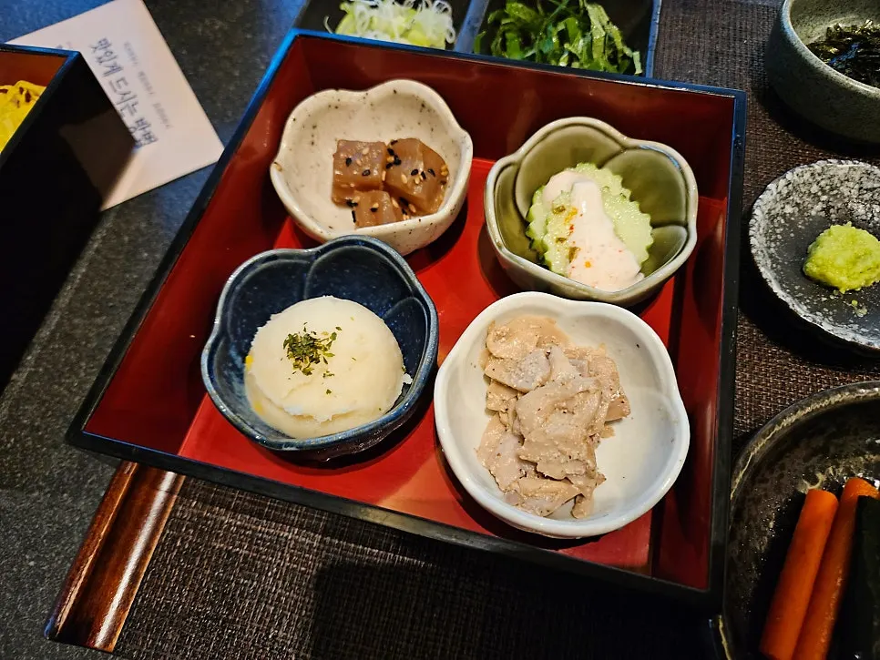 Pickles and wasabi served alongside the hitsumabushi