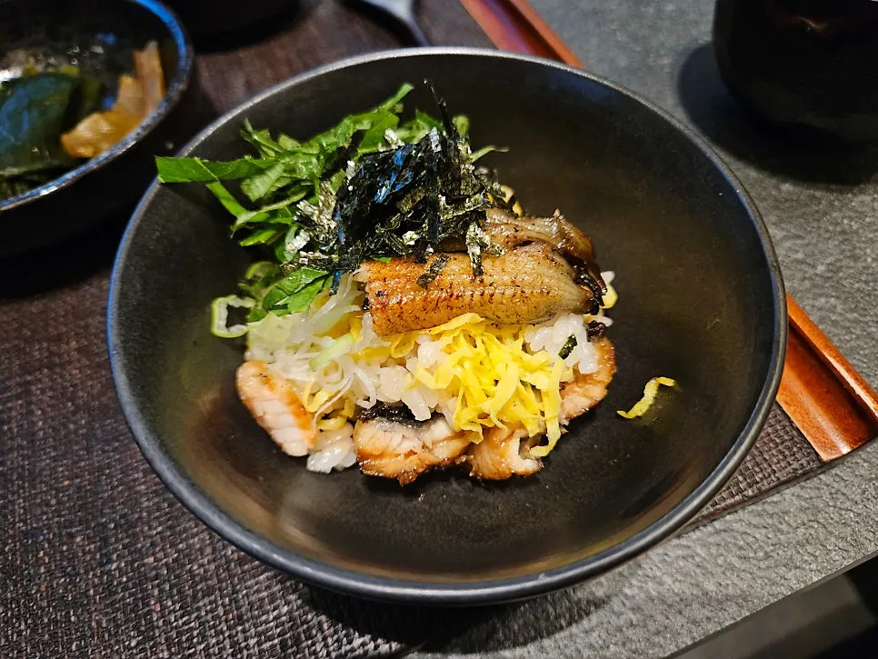 Second way to eat hitsumabushi, topped with perilla leaf, scallion, and dried seaweed flakes