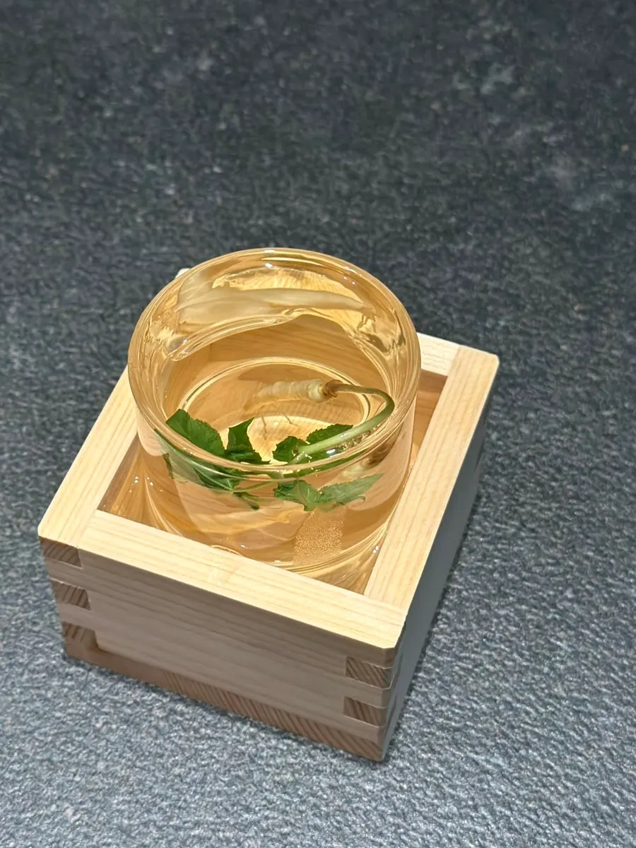 100-year vitality fresh ginseng wine with a whole sprout ginseng root inside