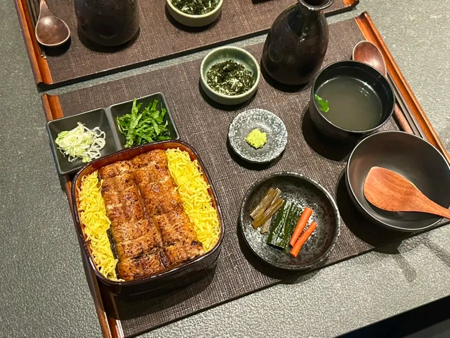 Nagoya-style eel rice bowl topped with yellow egg strips