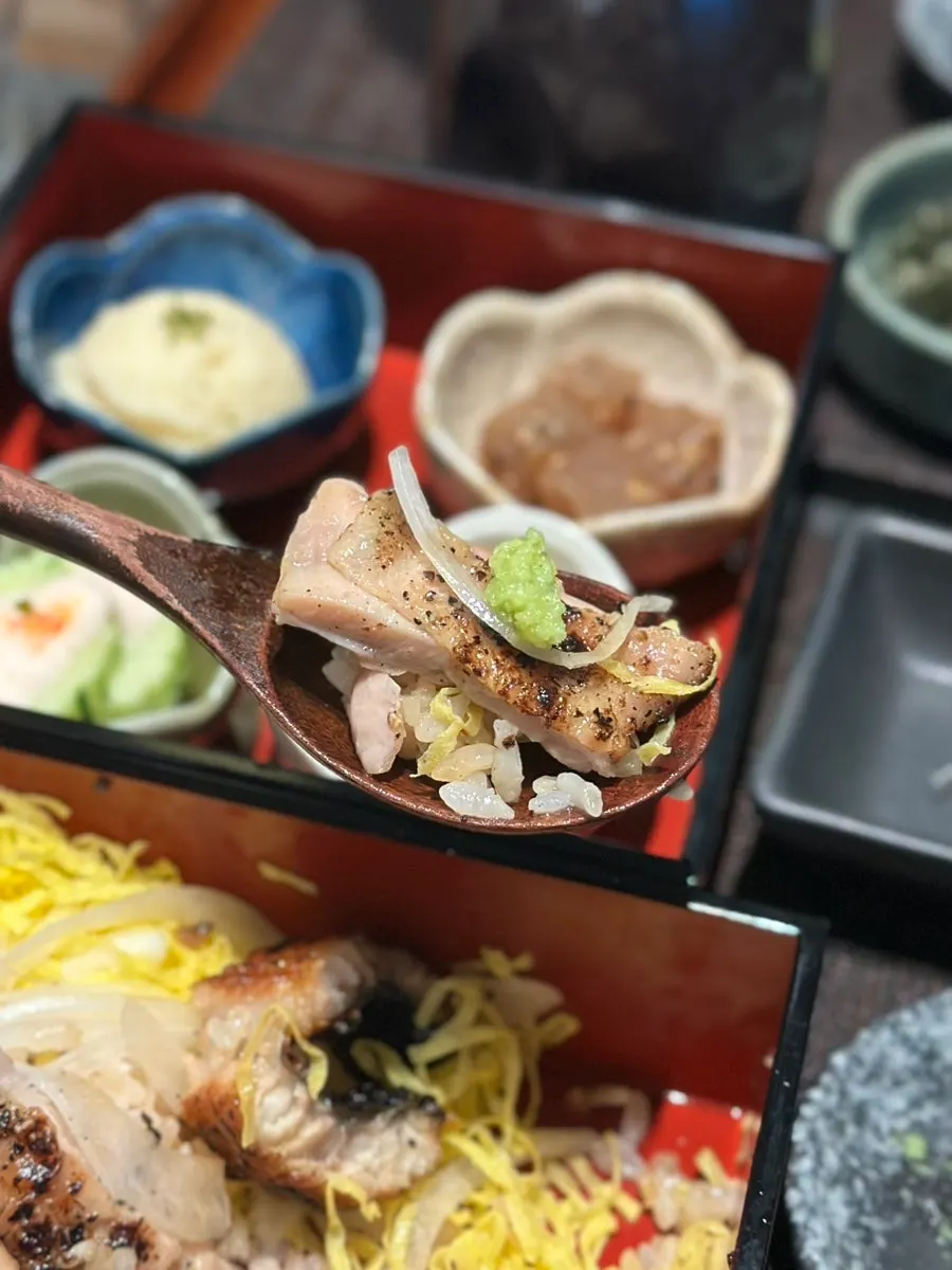 Charcoal-grilled chicken served over rice