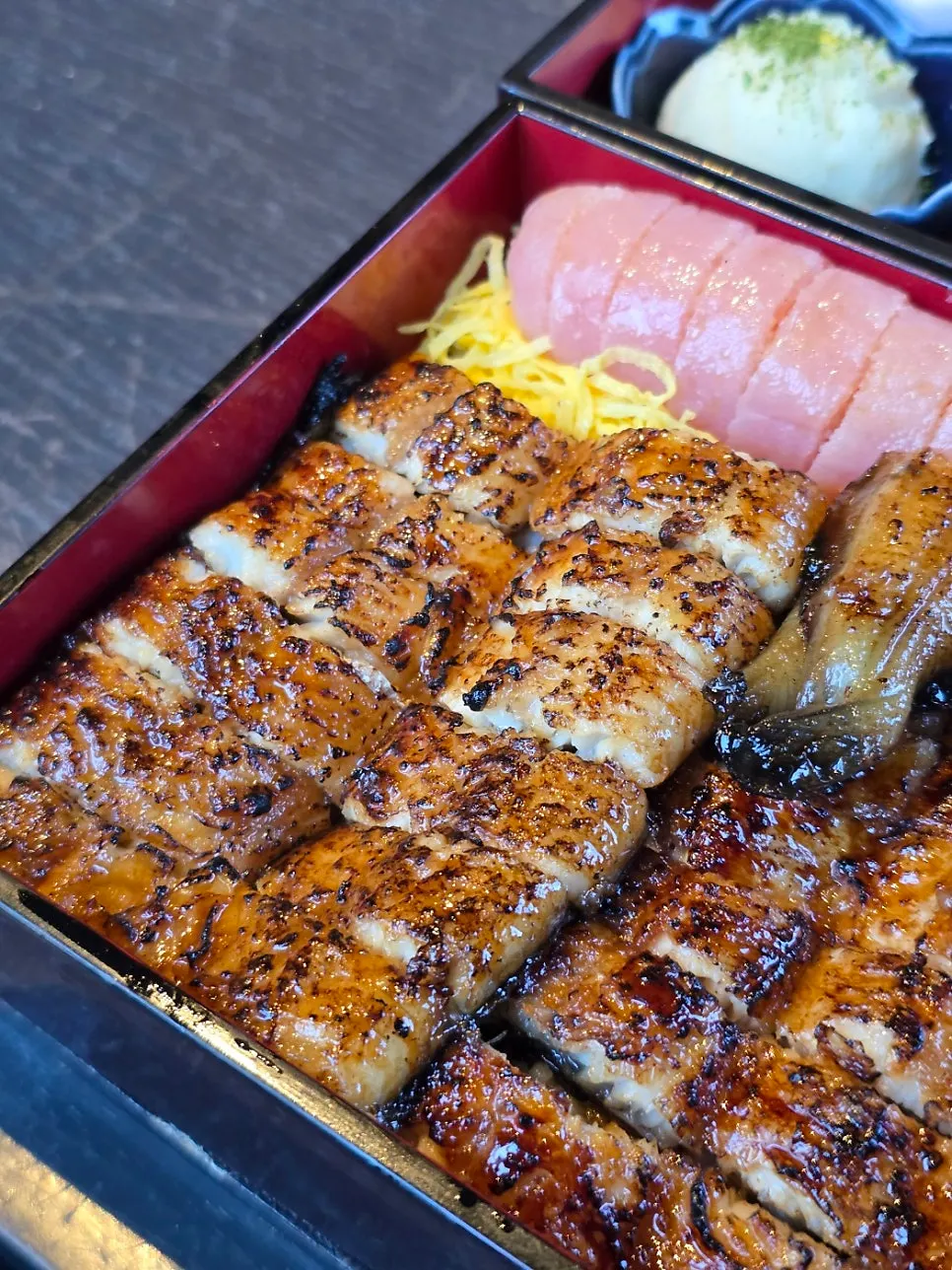 Lifting up a tender piece of eel