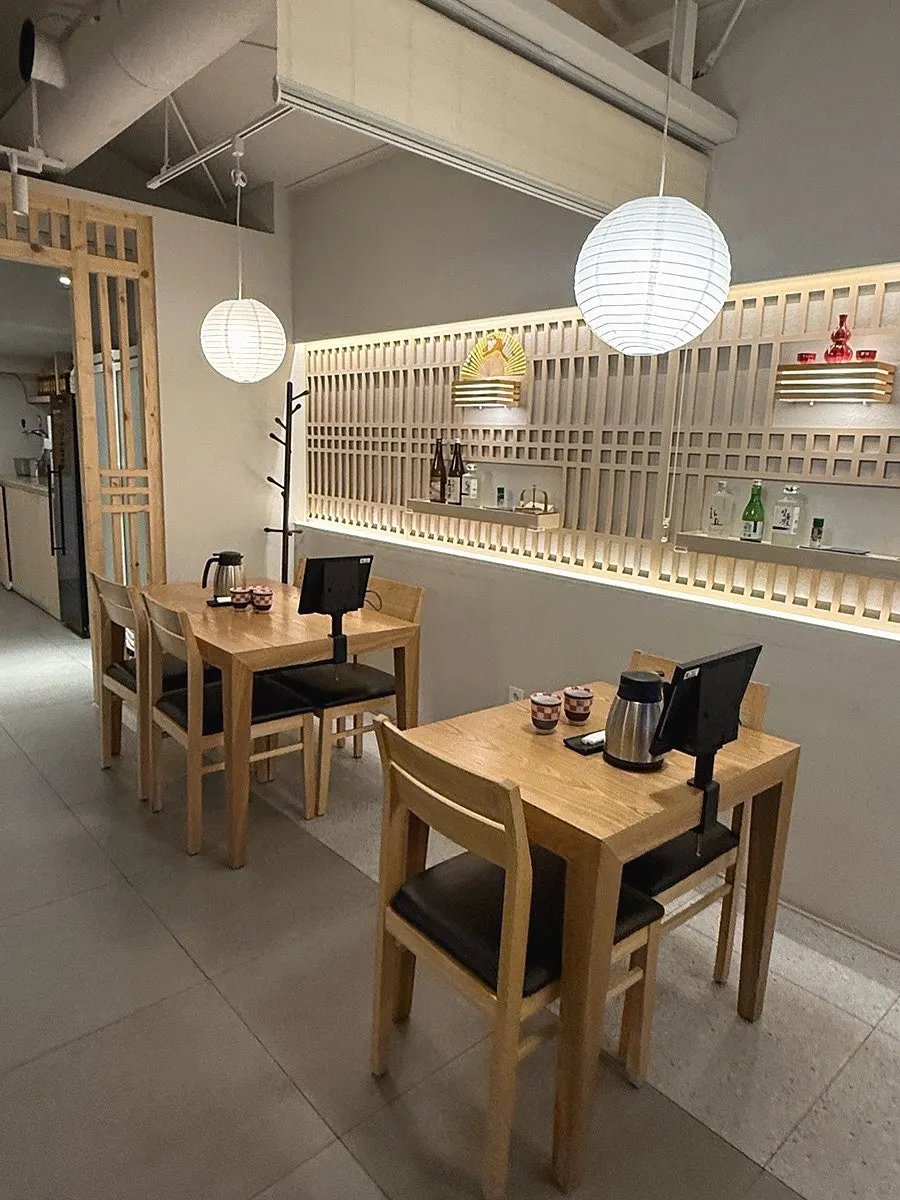 Unagiwa's dining hall seating under soft lighting