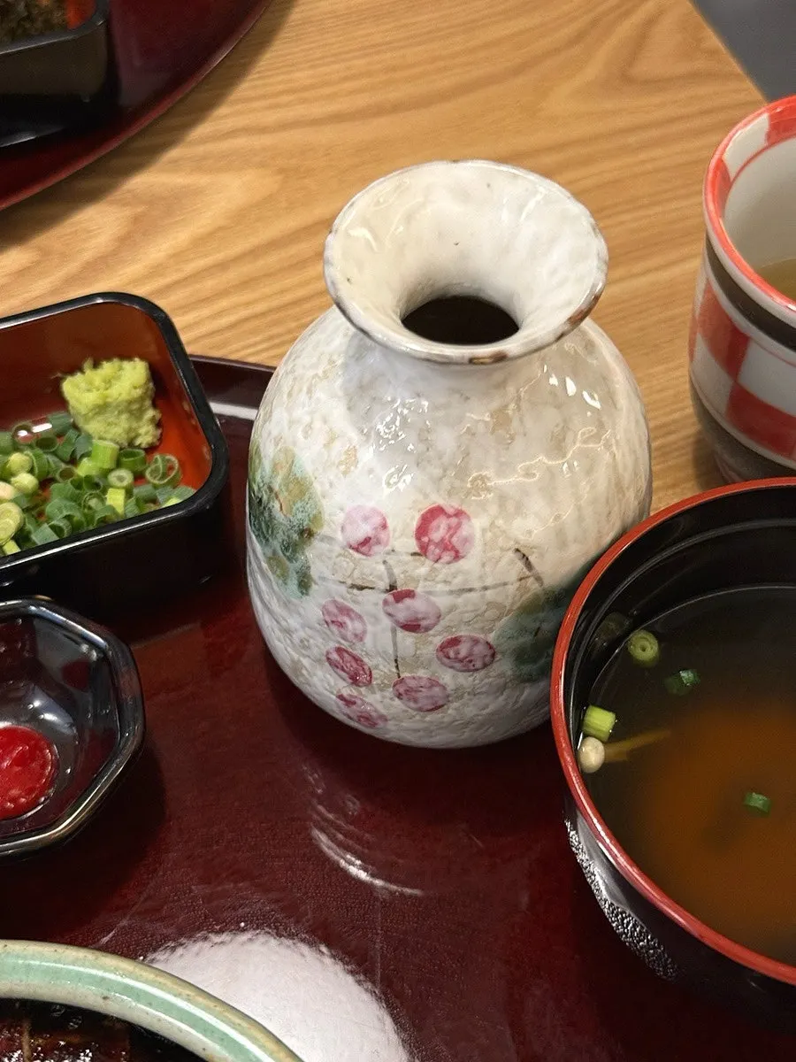 Salad and steamed egg served alongside the set