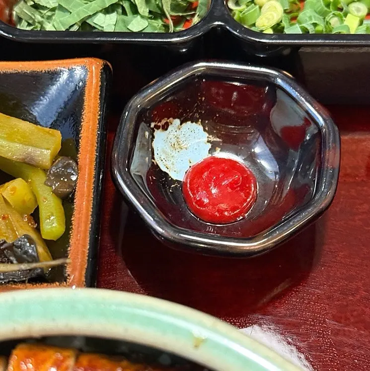 Plum sauce meant to dip into when the eel starts to feel rich
