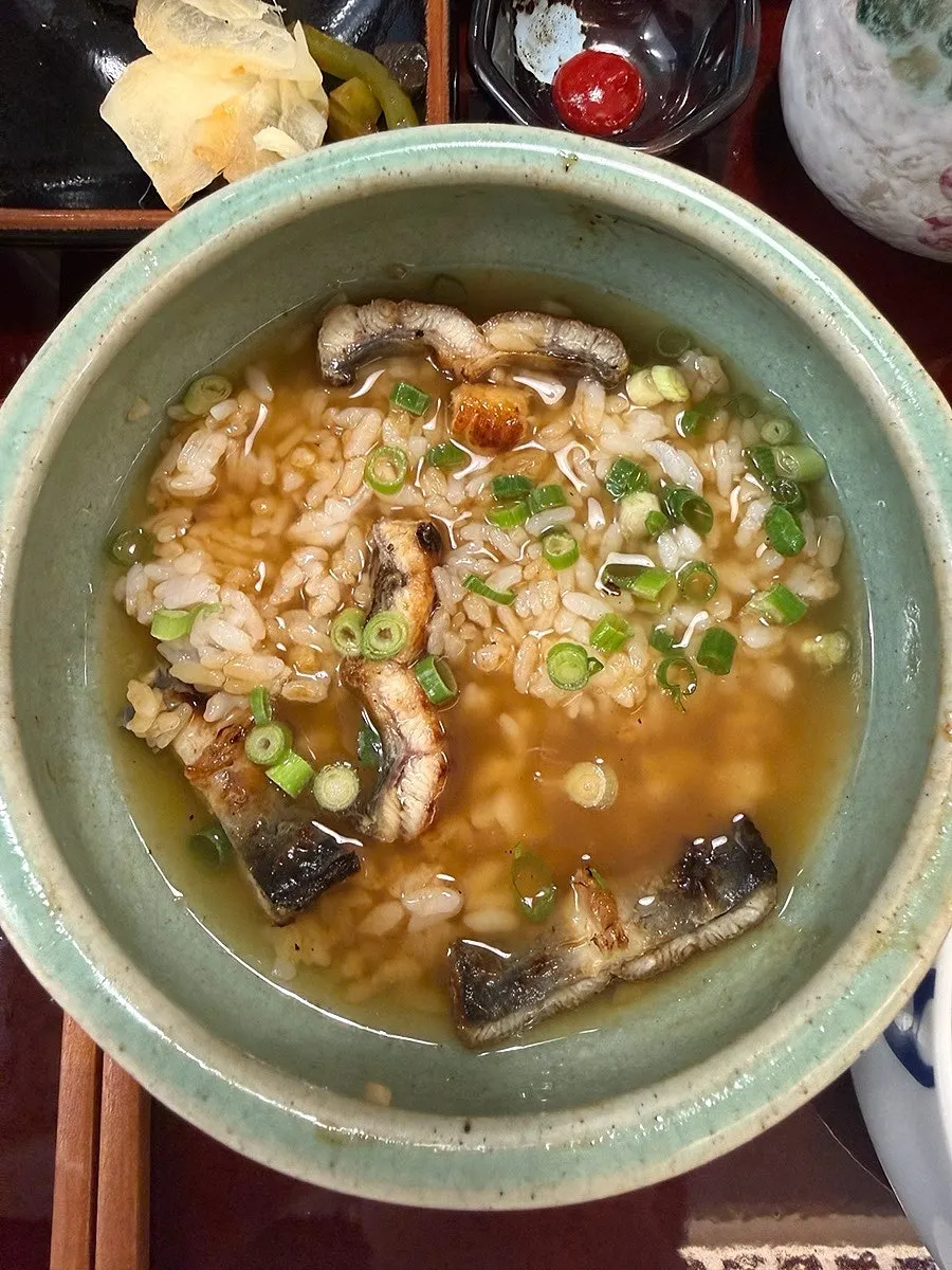 Eel rice bowl turned into ochazuke with broth poured over it
