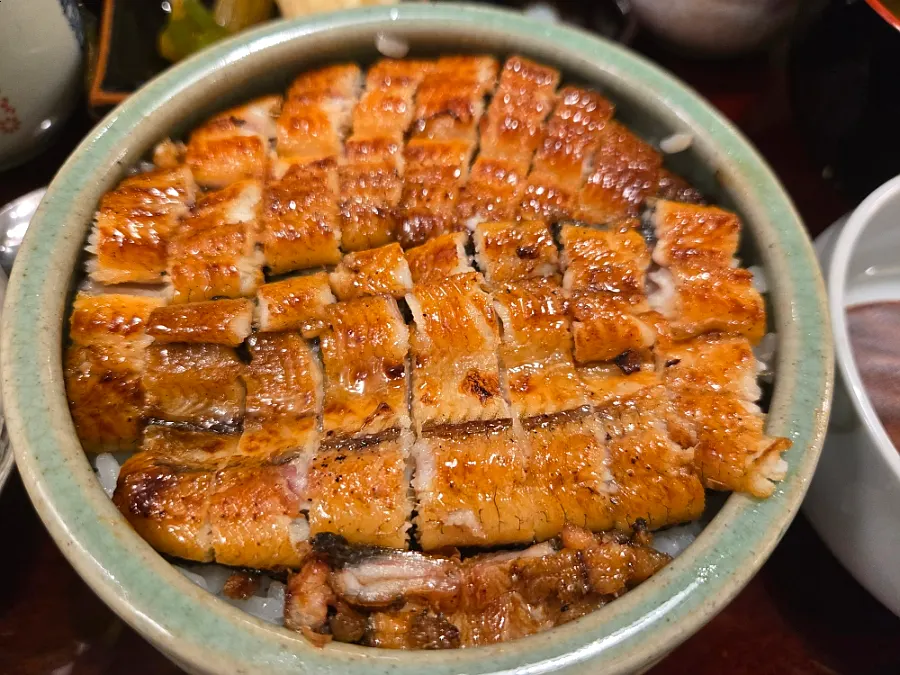 Nagoya-style eel rice bowl with the lid opened