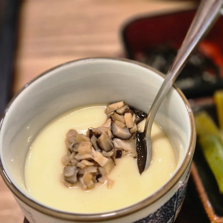 Chawanmushi appetizer topped with mushrooms