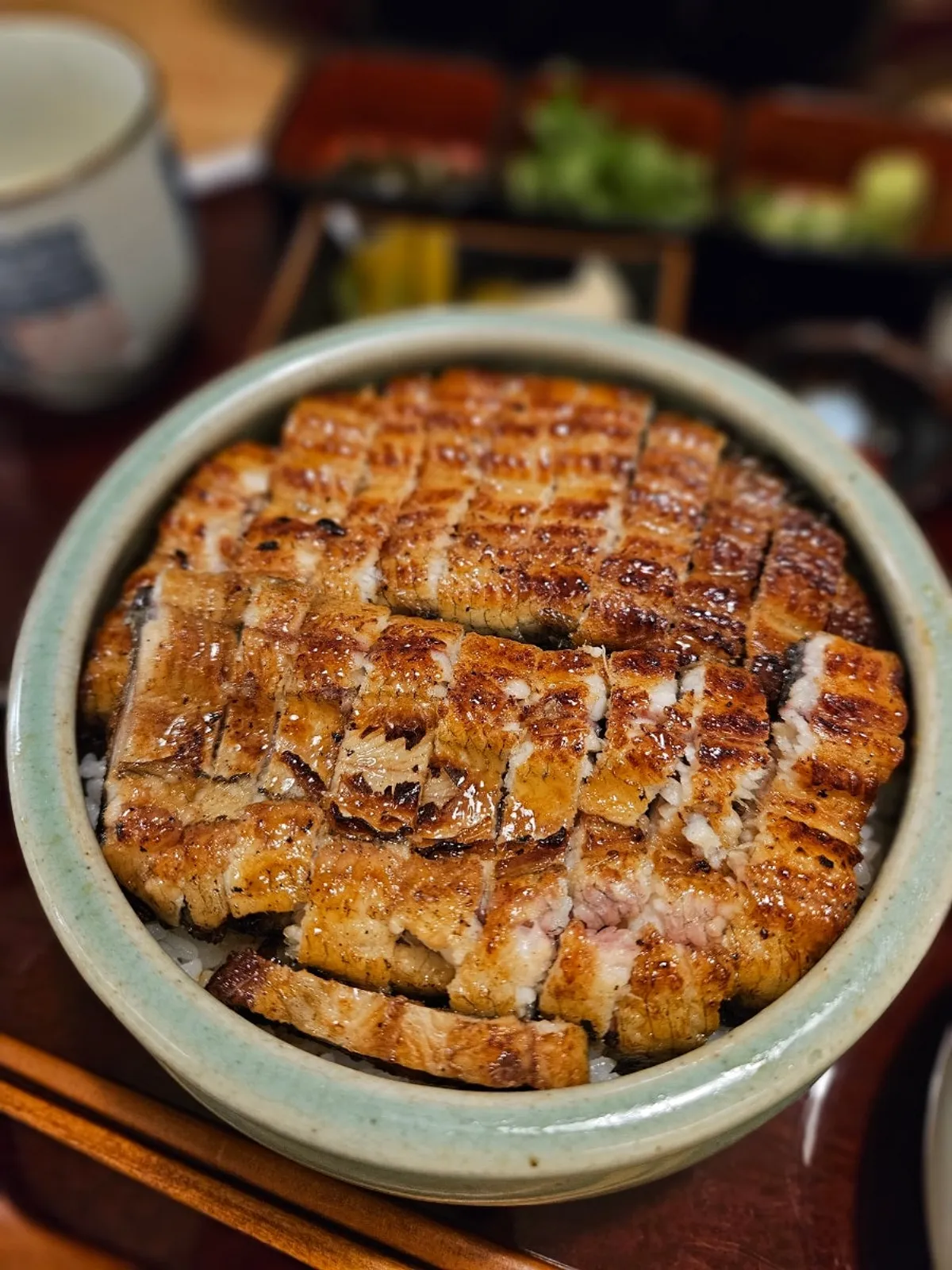 Hitsumabushi topped with sauce-glazed grilled eel