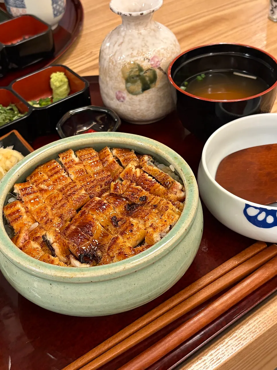 Hitsumabushi rice bowl topped with a whole eel