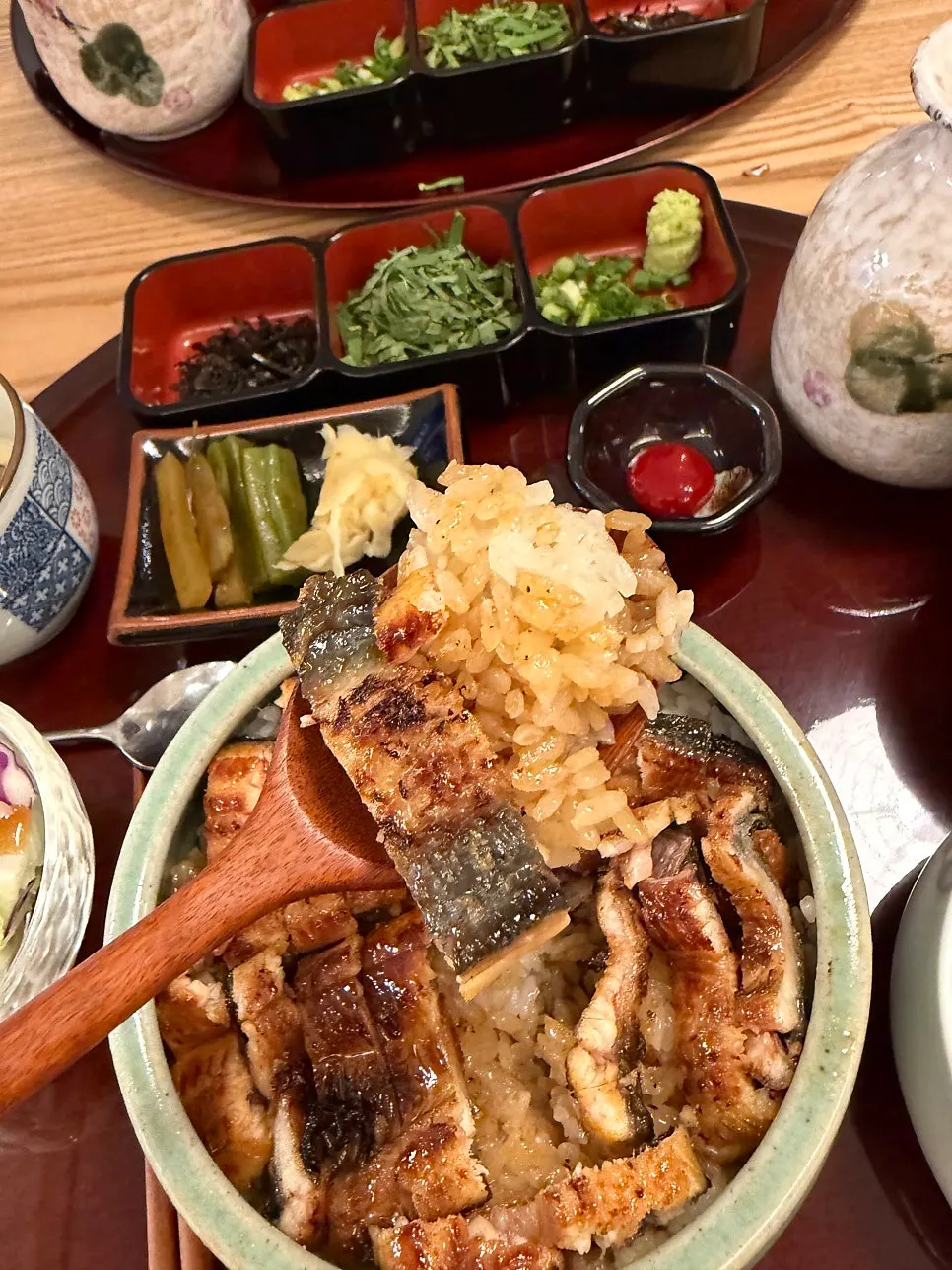 Hitsumabushi eel rice bowl divided into four parts