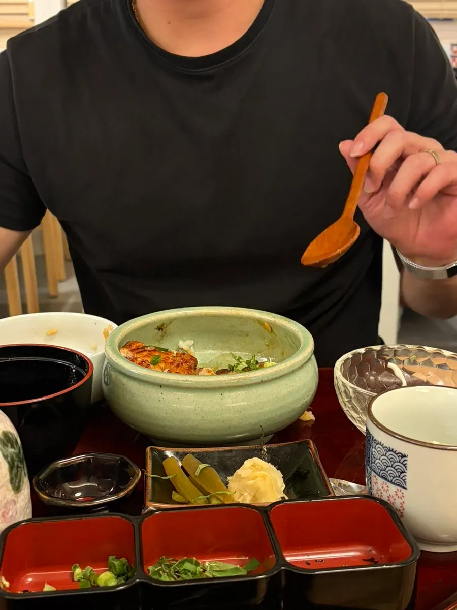 A spoonful of eel and rice eaten plain