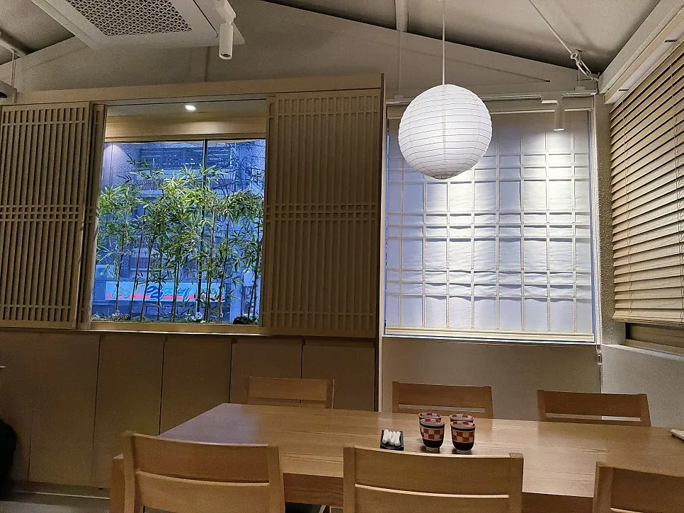 White wood-toned seating inside Unagiwa