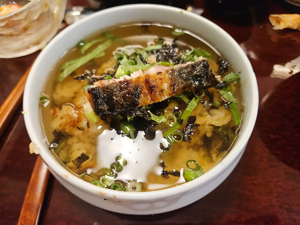 Final bowl made into ochazuke by pouring broth over rice