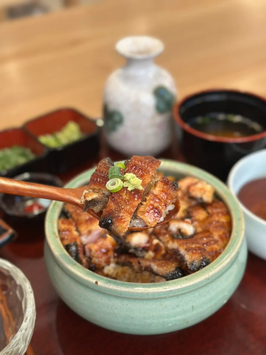 A spoonful of hitsumabushi eel rice bowl scooped up