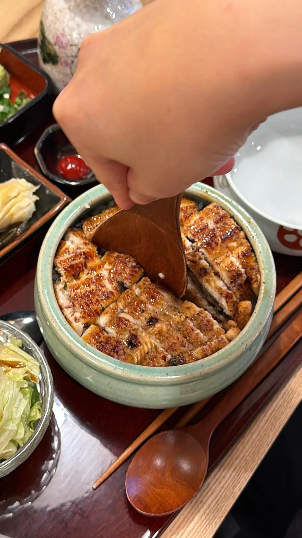 Hitsumabushi eel rice bowl divided into four portions