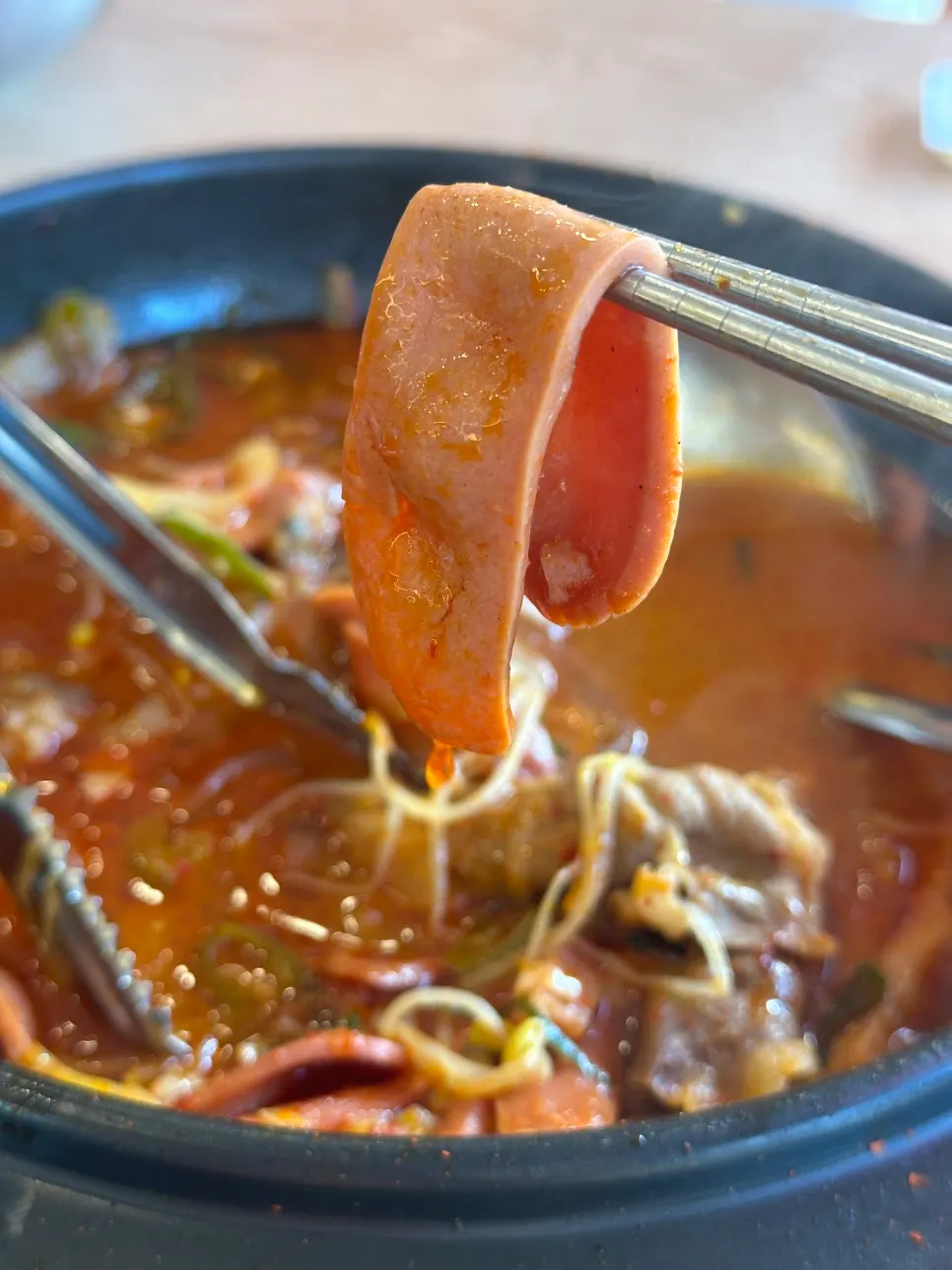 Budae jjigae with American-style sausage and glass noodles