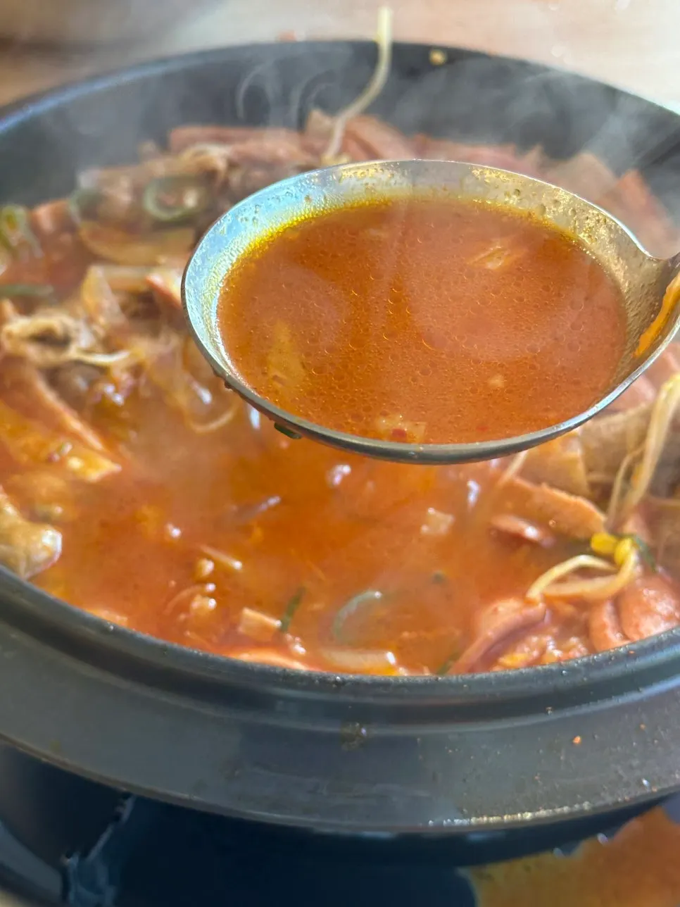 The jjamppong budae jjigae broth boiling away