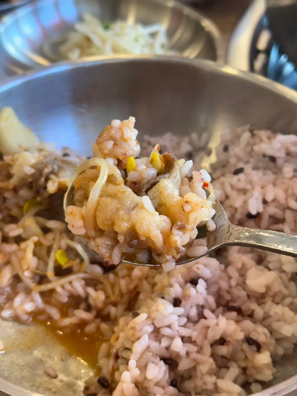 Butter rice mixed with broth and toppings