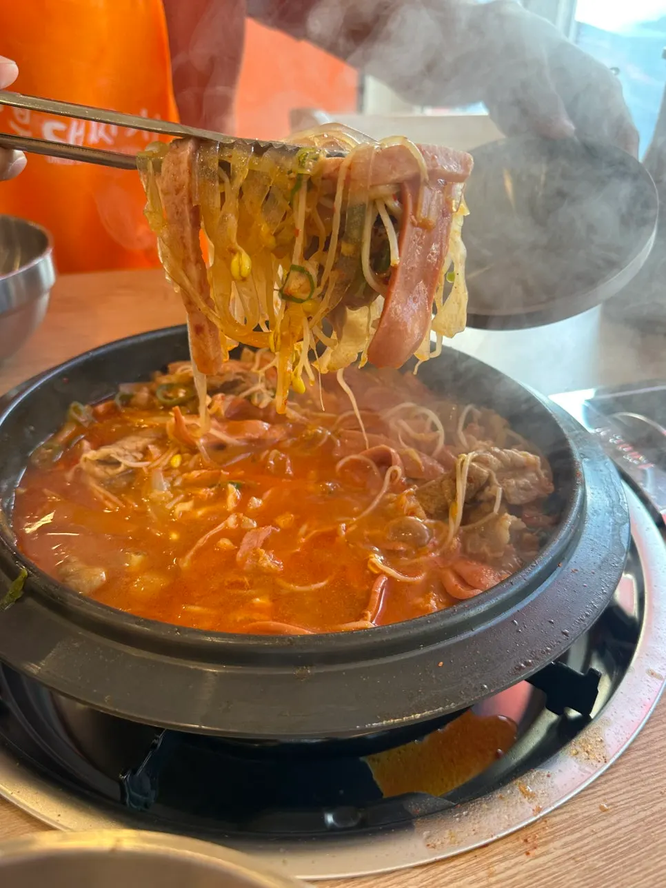 A generously set table of jjamppong budae jjigae