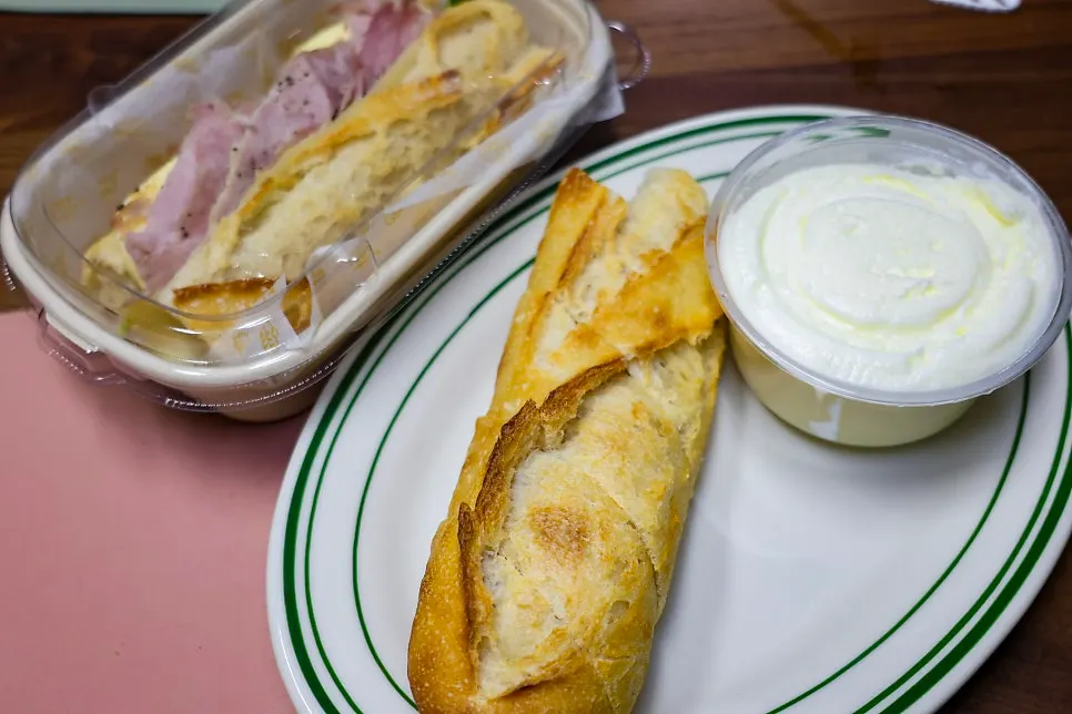 Jambon-beurre and baguette brunch spread on a home table