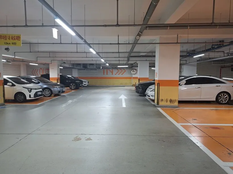 Basement parking lot with parking guide signage