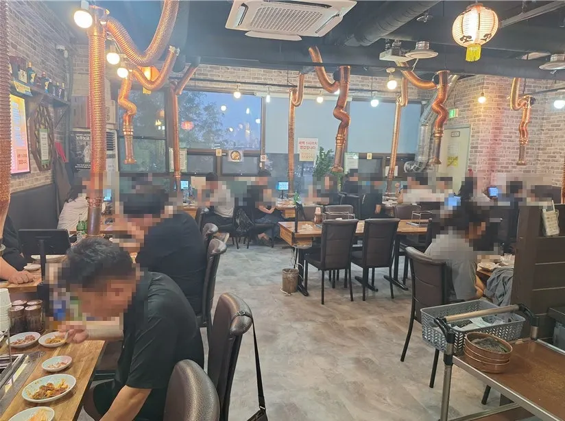 Interior of the restaurant, nearly full on Saturday evening