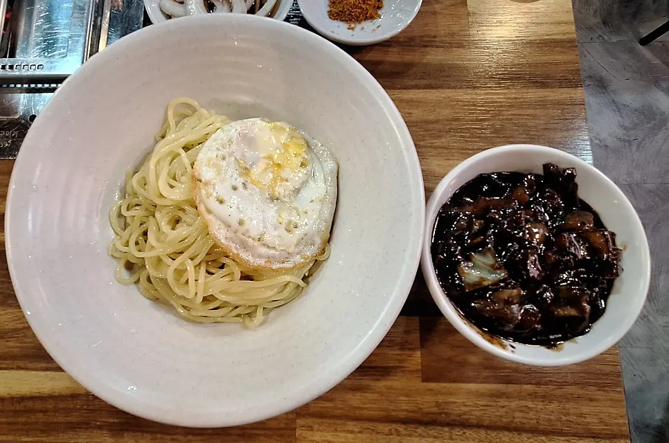 Ganjjajang served with noodles and sauce separately