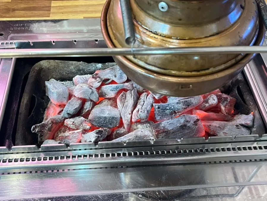 Charcoal skewer rack set on the table