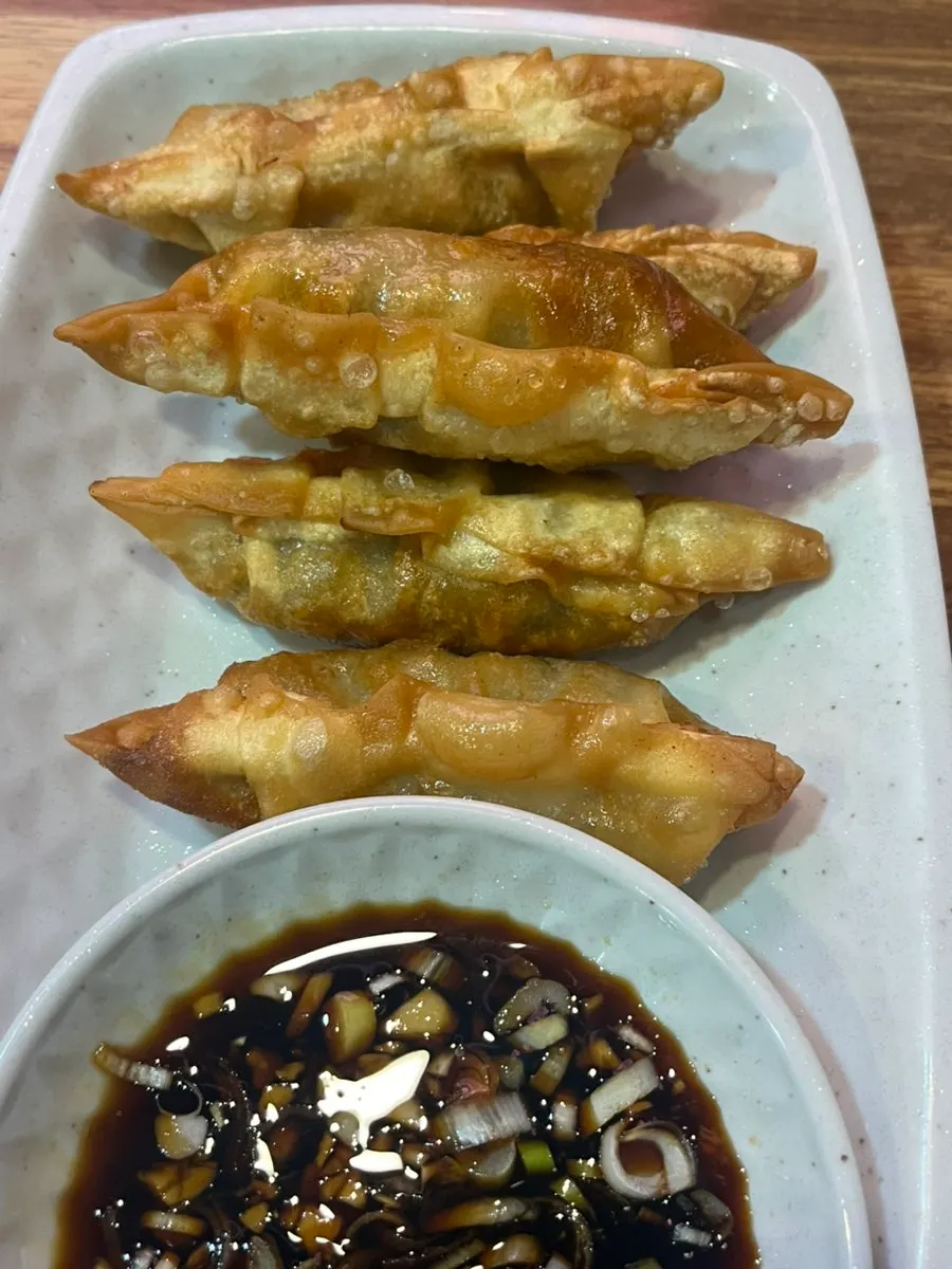 Bean sprouts served alongside the lamb skewers
