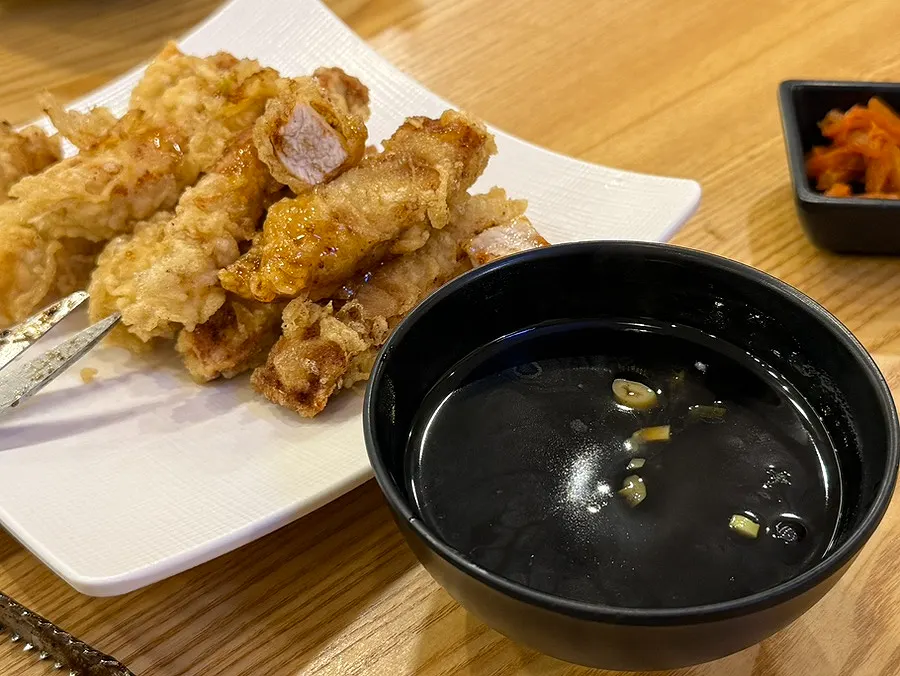 A plate of thick pork tenderloin tangsuyuk