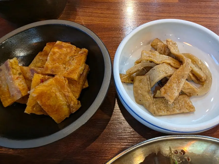 Side dish plates including eggplant and seasoned vegetables