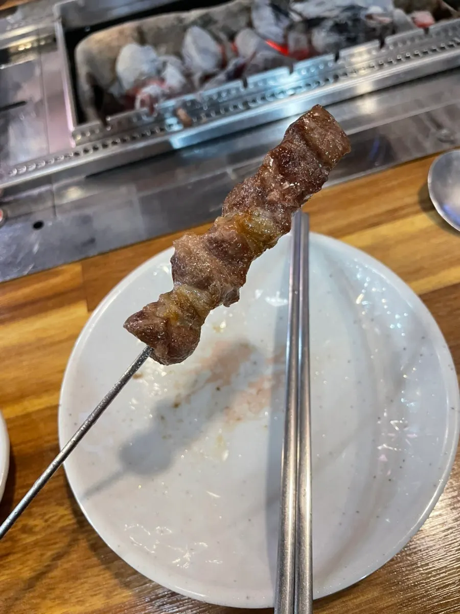 Lamb skewers grilling on the grill