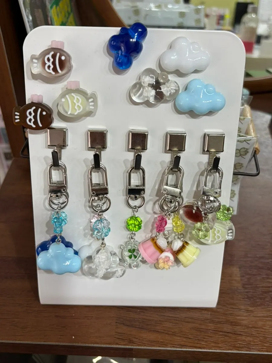 A variety of resin keyrings on display