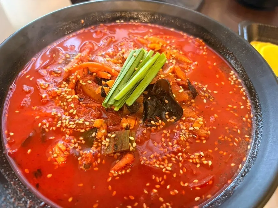 Broth and toppings in the Gyodong jjamppong at Bongga Gyodong Banjeom