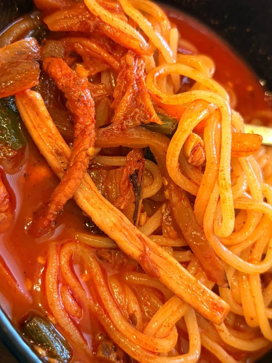 A spoonful of the rich Gyodong jjamppong broth