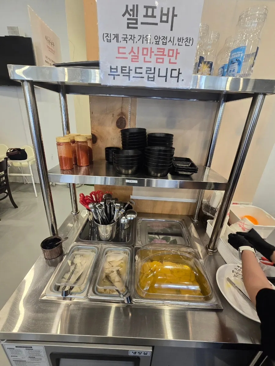 Bright interior table area at Bongga Gyodong Banjeom