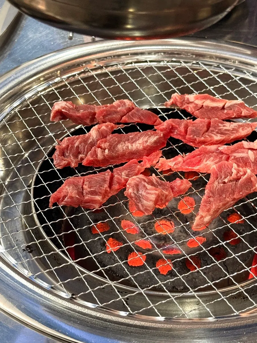 Charcoal-grilled short rib table setting at Untan Taepyeong