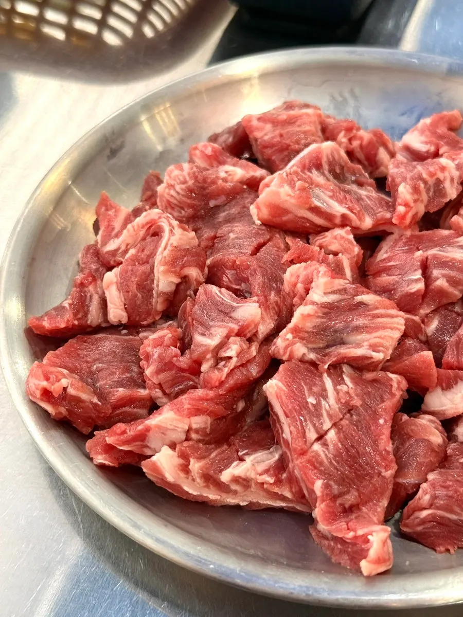 Raw beef short rib served on a plate