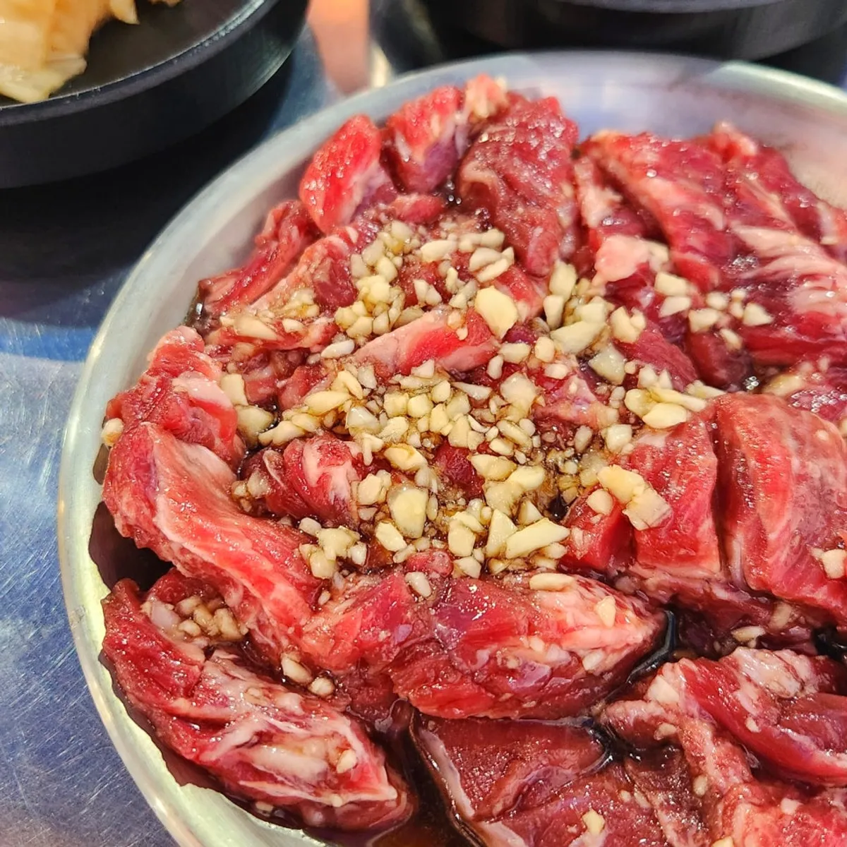 Uiseong garlic sogalbisal for two, topped with garlic