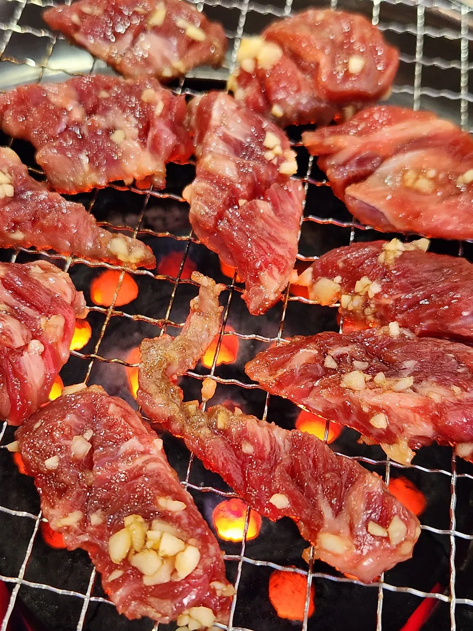Sogalbisal cooking with garlic on top