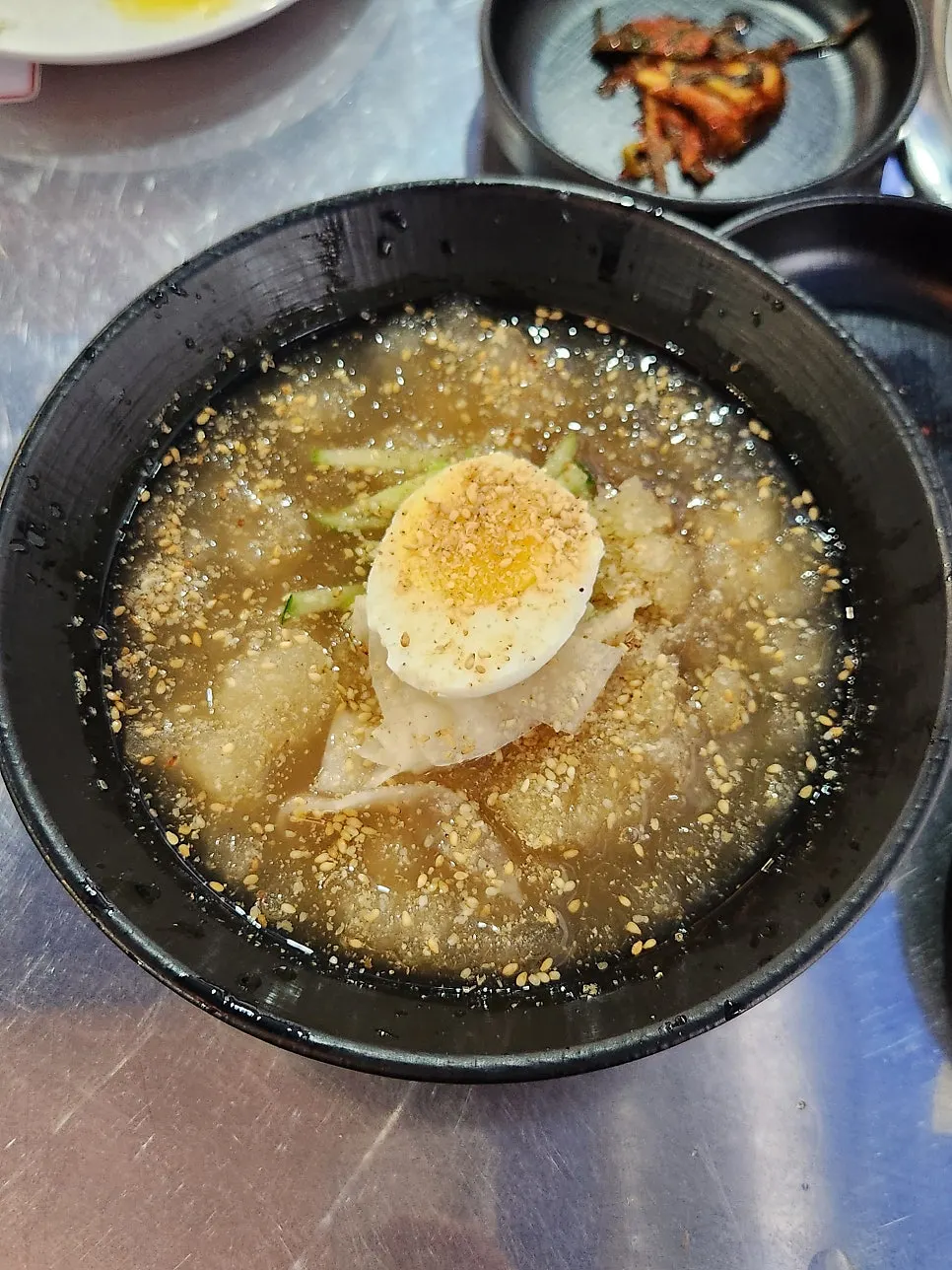 Naengmyeon noodles in cold broth