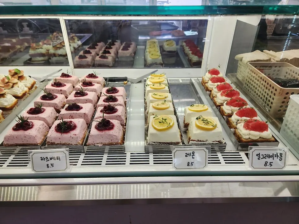 Cake slice display case at Upper and Under