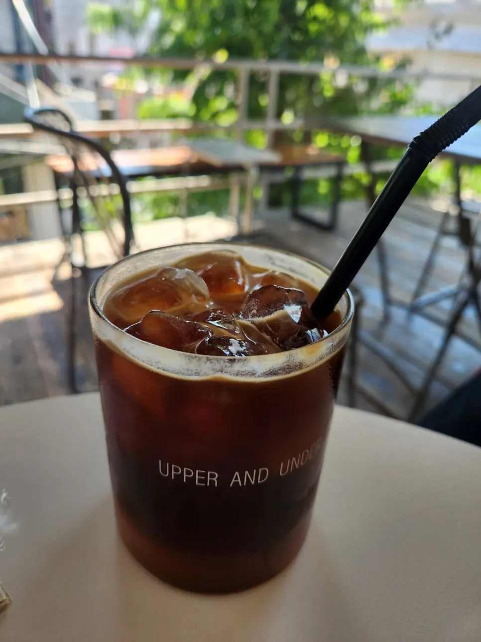 Iced americano and iced pistachio cream latte on the table