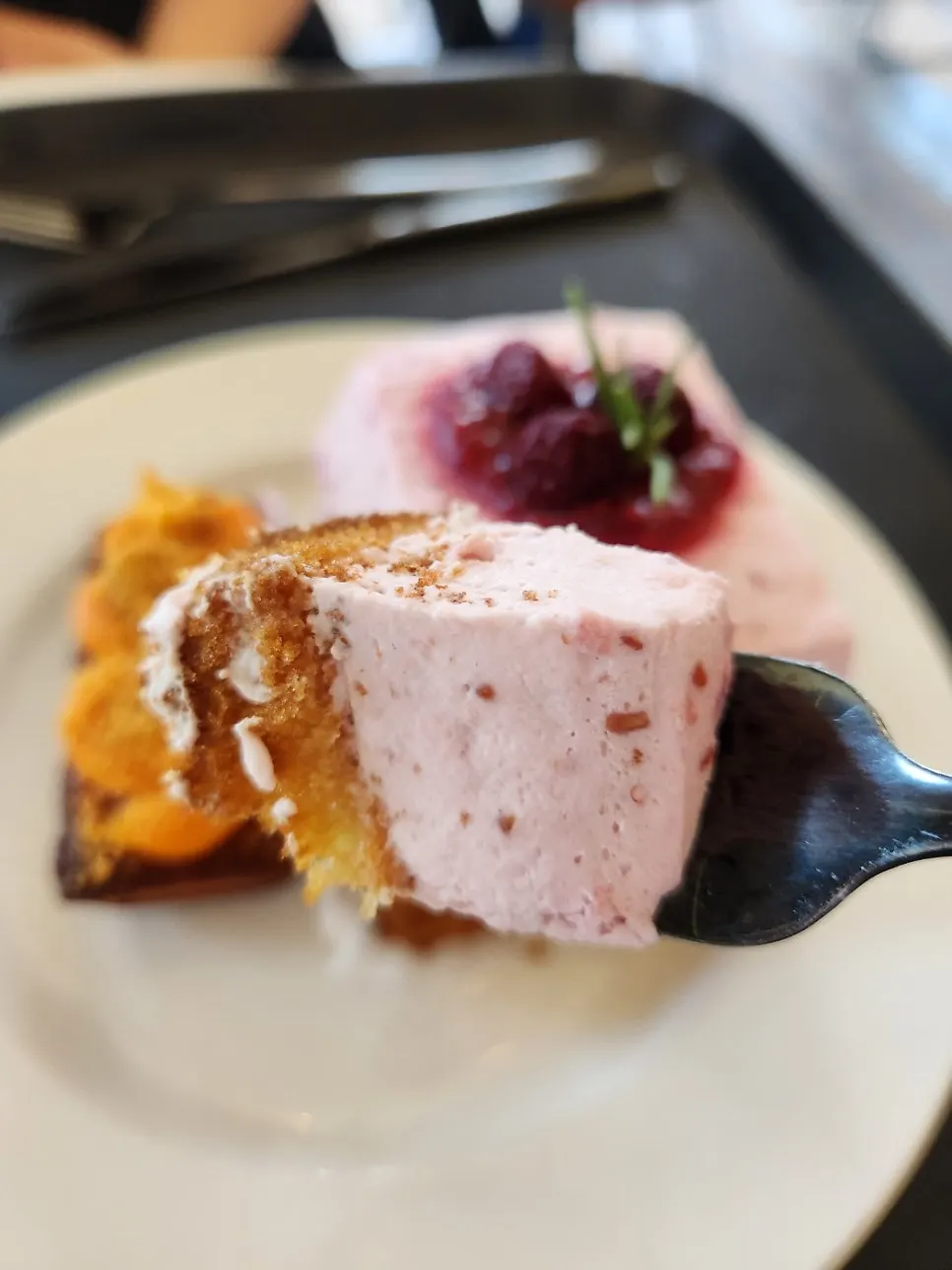 Raspberry cake slice at Upper and Under