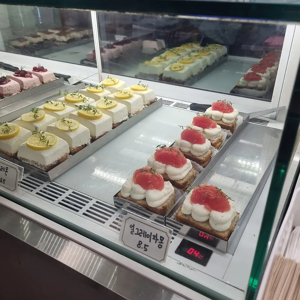 Dessert case with financiers and tarts on display