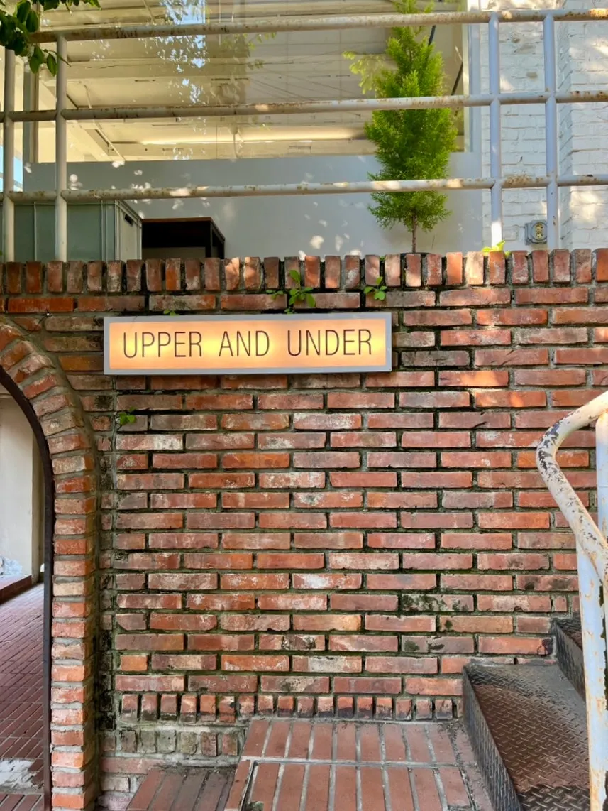 Café building's exterior wall with red brick and white walls