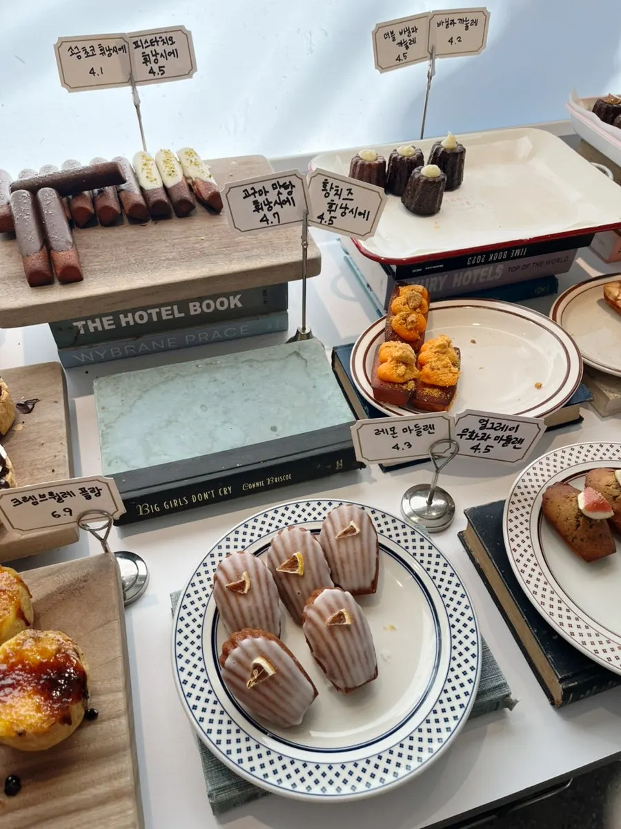 Madeleines and baked goods on display