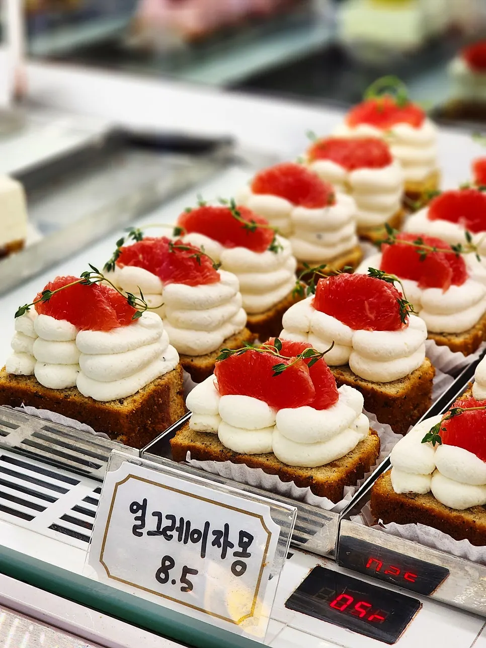 Showcase with tiramisu slice cakes